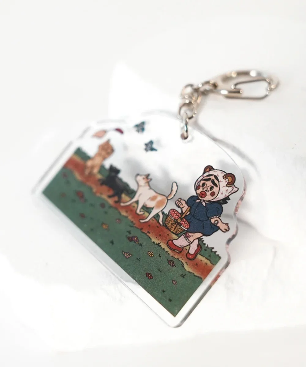 アクリルキーホルダー（猫と少女）