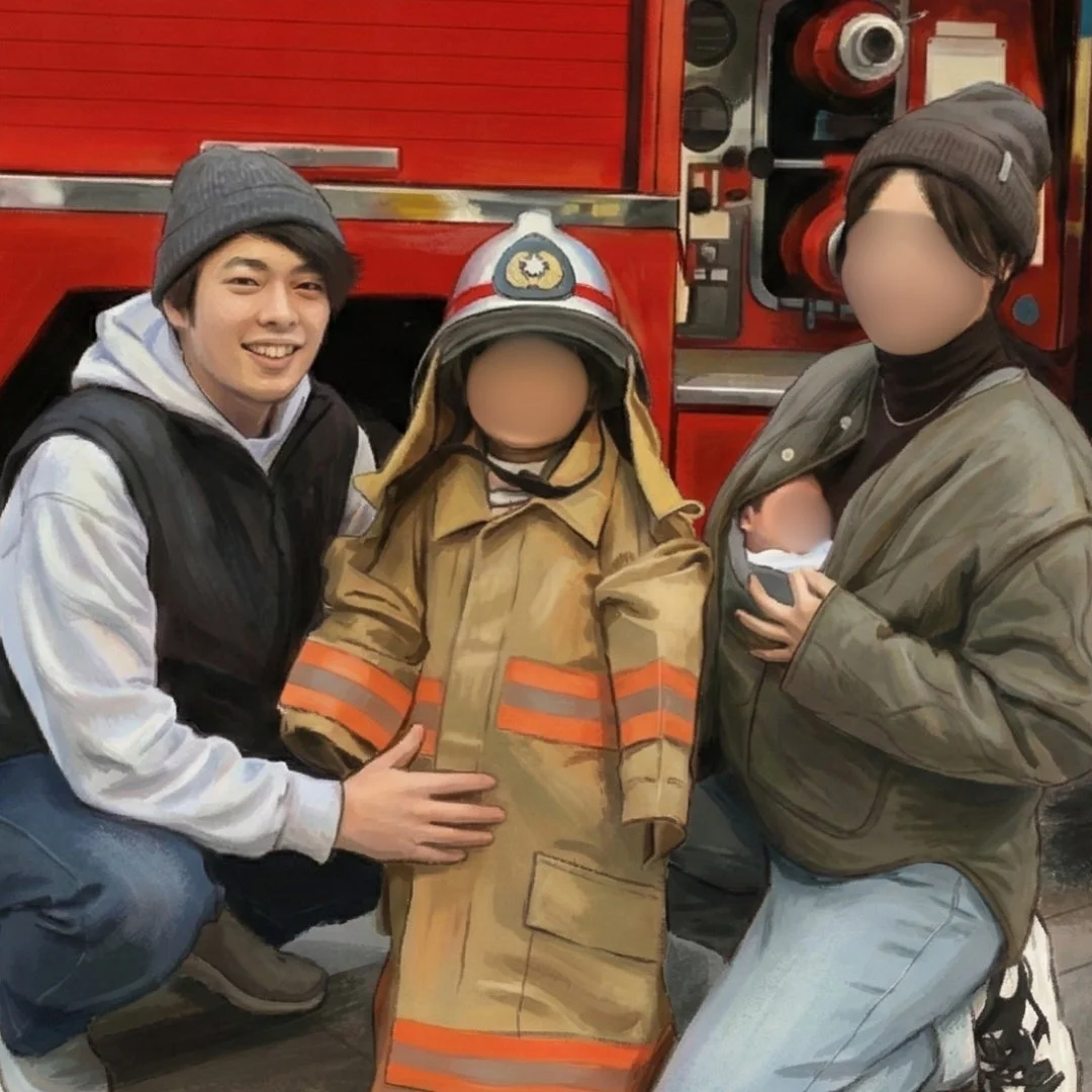 消防車を背景に家族写真