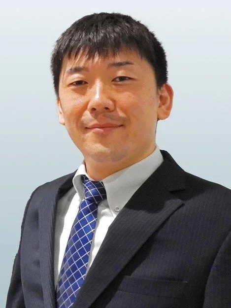 塚田 芳久氏